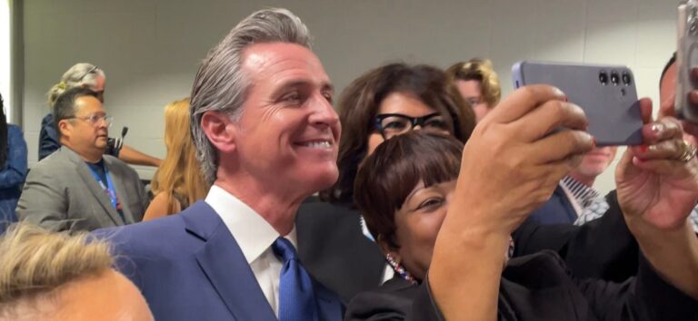 Gavin Newsom selfie with supporters Democrats convention Chicago Aug 19 2024