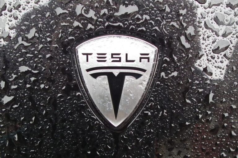 tesla motors logo badge scaled